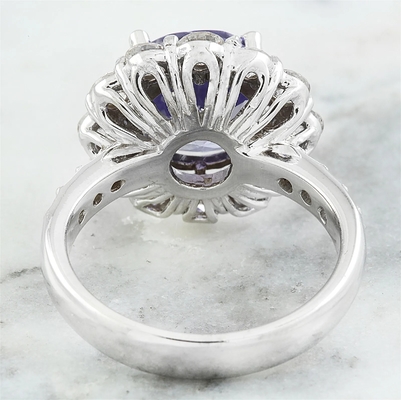 Les bijoutiers matraquent 1/4 accent Sterling Silver Ring du carat T.G.W. Tanzanite And White CZ