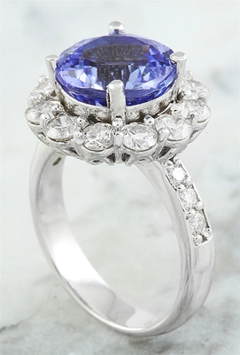Les bijoutiers matraquent 1/4 accent Sterling Silver Ring du carat T.G.W. Tanzanite And White CZ