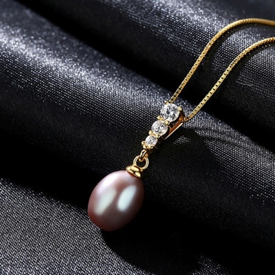 le collier 14K pendant pour des femmes est avec décoré une perle d'eau douce de 6MM