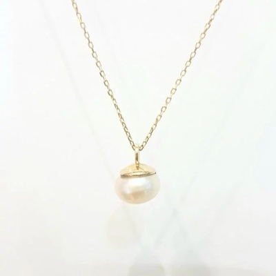 le collier 14K pendant pour des femmes est avec décoré une perle d'eau douce de 6MM
