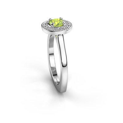 Anneau de halo de platine de halo avec un grand Peridot embrassé par de plus petites pierres gemmes classées