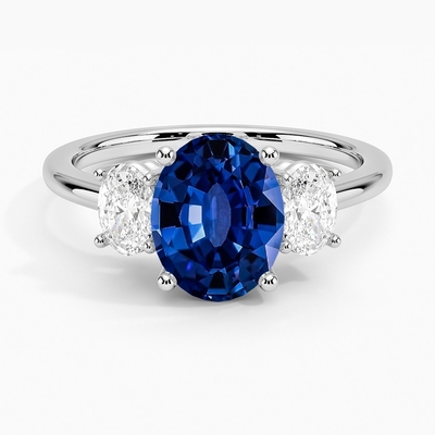 Sapphire Capella Three Stone Lab créée par laboratoire CZ Ring Set avec le saphir créé par laboratoire ovale bleu de 9x7mm