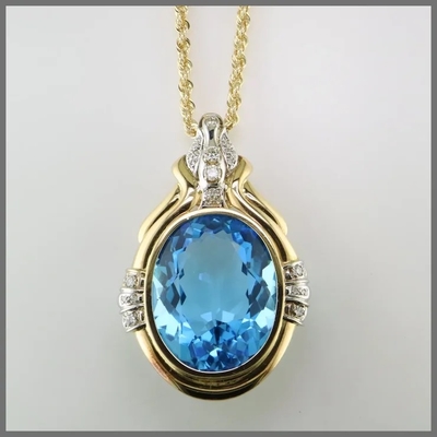 14K a en rond coupé le pendant bleu de Topaz And CZ augmente pour des femmes