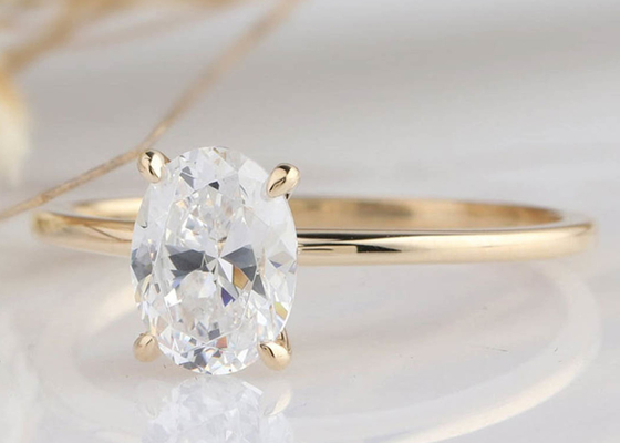taille coupée ovale du matériel 0.7×0.9cm d'or de l'anneau développée par laboratoire 14K de 1.5ct Moissanite