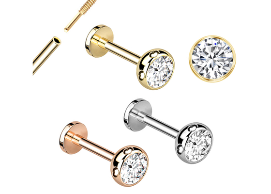 Les boucles d'oreille perçantes de bijoux de corps stérile d'or vissent le diamètre 3×3mm de style